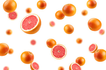 Falling grapefruit isolated on white background, selective focus