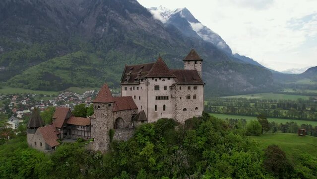 beautiful medieval castles of Europe - impressive Gutenberg in Liechtenstein, border with Switzerland, surrounded by Alps mountains, aerial view