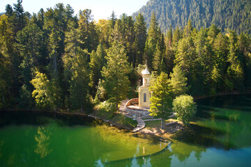 Aerial view of Orthodox Chapel of the Holy Prophet Solomon on the shore of a Emerald Lake among the...
