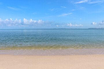 Fototapeta na wymiar Blue sky background with beach and white sand beach in Pattaya, Thailand