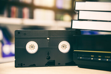 Pile of video cassette tape VHS with video playback old retro style stack concept of vintage...