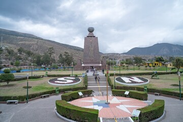 The Mitad del Mundo in Quito Ecuador during an overcast day