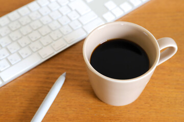 コーヒーとキーボード　ビジネスイメージ