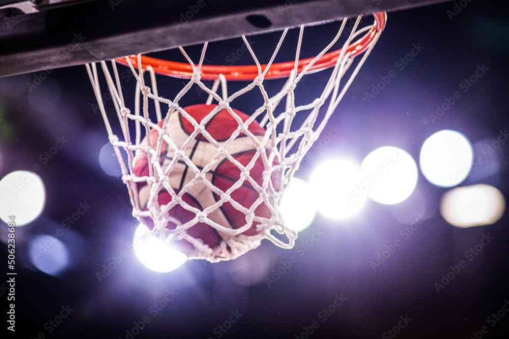 Wall mural basketball game ball going through hoop