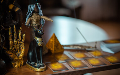 Magical illustration, esoteric concept. Candles and other magical stuff. Wicca and pagan attributes on a table	
