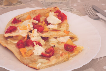 Homemade Pizza With Tomatoes And Cheese