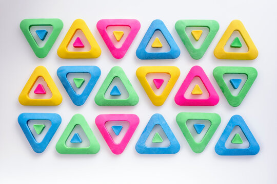 erasers in a triangular shape