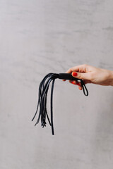 Flogger of whip in closeup 