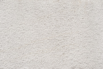White old stone background, bright cement wall texture.