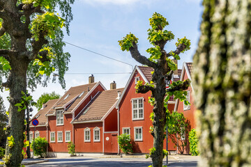 Fototapeta na wymiar Oslo Red Wooden Houses. Springtime in Norwegian Capital.