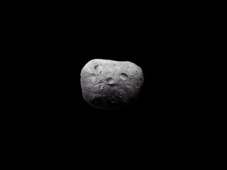 Asteroid covered with craters. Space rock on a black background. Large meteorite isolated.