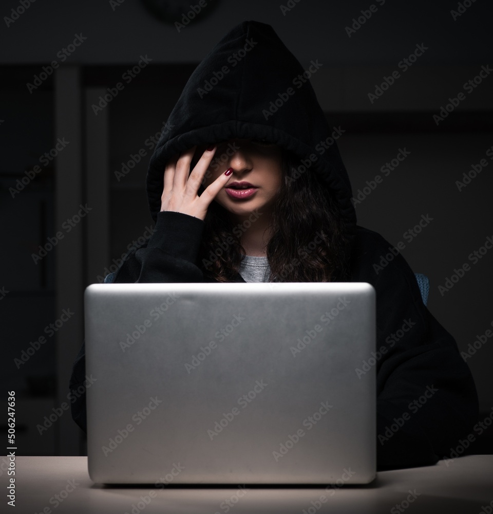 Poster female hacker hacking security firewall late in office
