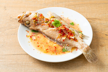 Steamed grouper fish with lime and chillies
