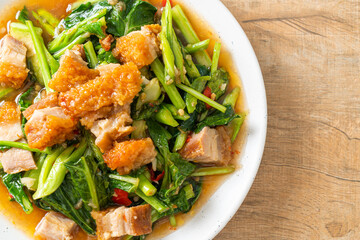 Stir-fried kale vegetable with crispy pork