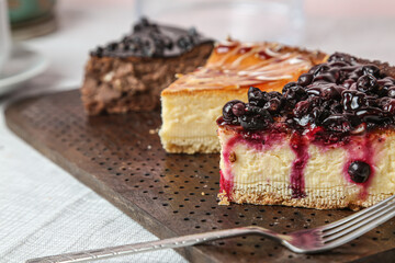 Creamy cheese with strawberries and winter berries. Creative atmospheric design.