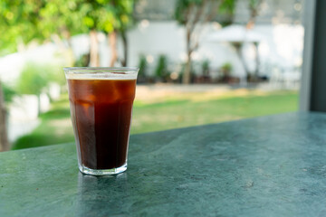 iced americano coffee glass on table
