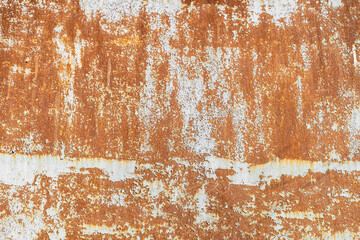 Background of a rusty iron sheet stained with white paint with red stains of rust and destruction...