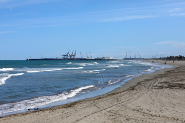 landscape by the coast sea. Sea port on background