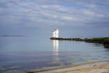 Fototapeta premium The Carraig Fhada lighthouse near Port Ellen on the isle of Islay