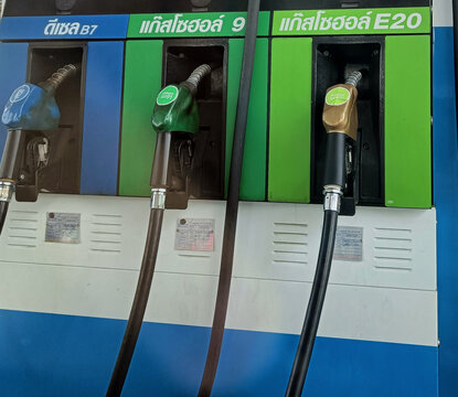 Bangkok, Thailand - May 16, 2022: Thai Petrol pump filling nozzles , Gas station