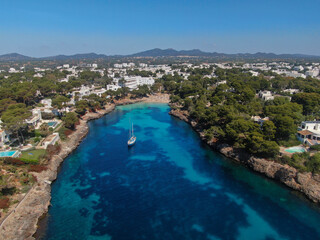 Cala Esmeralda, Cala D or Mallorca Beautiful view of the seacoast of Majorca with an amazing turquoise sea, in the middle of the nature. Concept of summer, travel, relax and enjoy