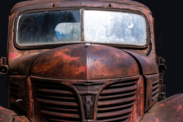 Old Rusty Truck against a black background
