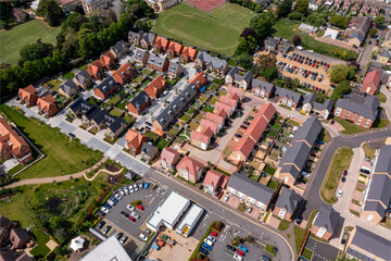 A newly built housing estate with uniform rows of houses