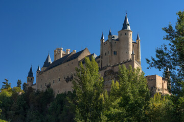 Fototapeta na wymiar View of the Alcazar fortress and gardens of segovia, listed world Heritage centre by UNESCO