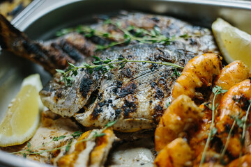 grilled fish  with vegetables and shrimps