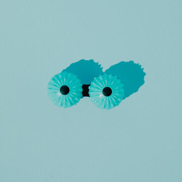 Pastel blue lovely parasols.Sophisticated style.Light air delicate artisitc image, free space.