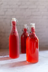 rose Kombucha in glass bottle, fermented tea drink, healthy beverage