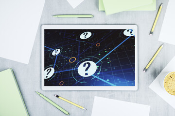 Creative concept of question mark illustration on modern digital tablet screen. FAQ and search...
