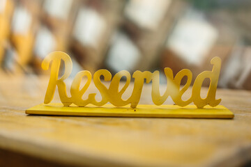 reserved sign in a bar