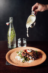 fried meat with sauce