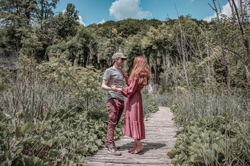 Couple enjoying the Plitvice Lakes National Park in Croatia.
