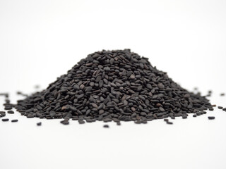 Black sesame seed isolated on white background. spot focus.