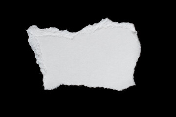 a white piece of paper on a black isolated background