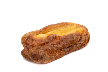 Cream ears, cream bows. Puff pastry intertwined with vanilla pastry cream. Isolated on white background.