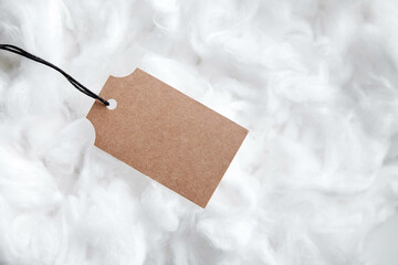 Label tag mockup on white cotton background