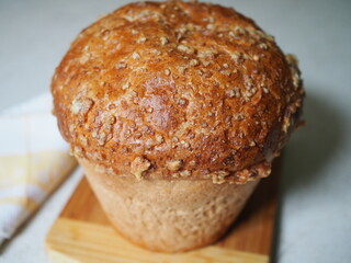 Russian national bread Kalach on a wooden background. National bread products
