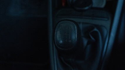 Inside view of car with a view of gear shift