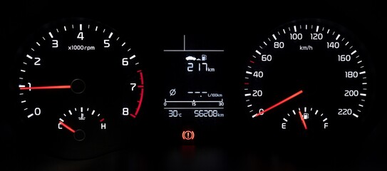 Fototapeta premium Inside view of car with a view of speedometer