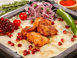 Chicken hip barbecue served onion