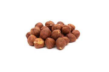 A handful of hazelnuts, isolated on white background.The hazelnut is the nut-like fruit of the common hazel, Corylus avellana. Etymologically it comes from the Latin nux abellana.