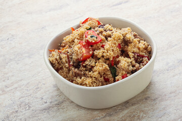 Arabic cous cous with meat and tomato