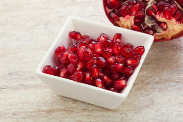 Ripe red Pomegranate seeds in the bowl