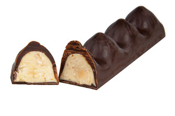 Chocolate sweet candy with nut glazed in half isolated on the white background