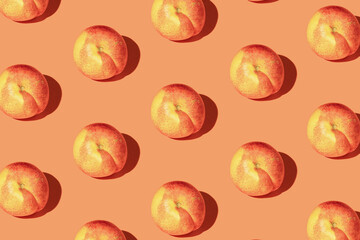 Seamless pattern with nectarine. Tropical abstract background. Nectarine on the pastel background.