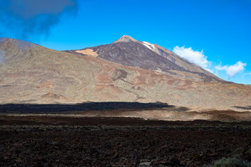 Visiting Teide national park on Tenerife and view on volcanic landscapes, Canary islands, Spain