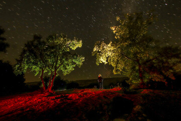 Anthropomorphic tombs in the dark, under the stars
